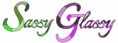 "Sassy" written in various shades of green and "Glassy" in shades of purple. custom stained glass and glass art in Colorado Springs