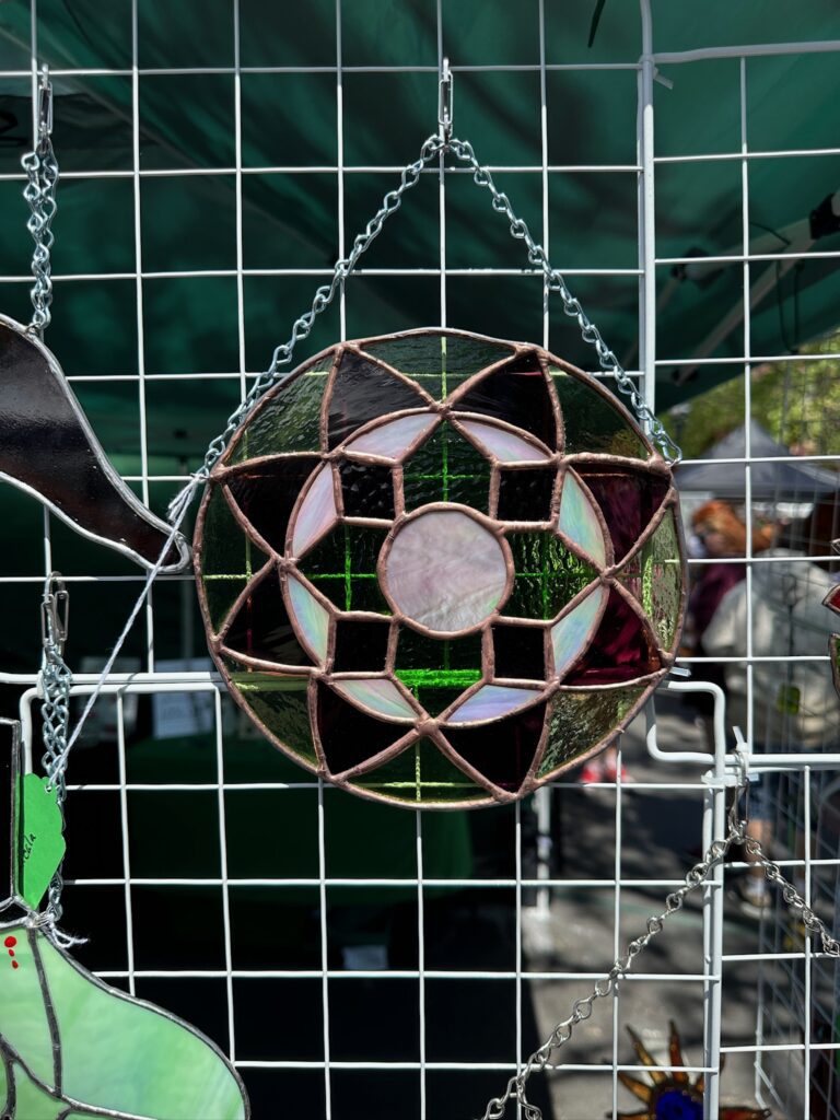 green, purple, and white mandala